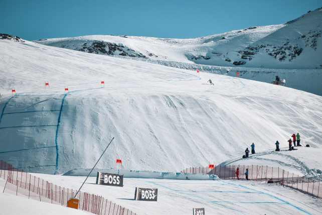 An empty ski race course, perfectly prepared, is pictured on the mountain