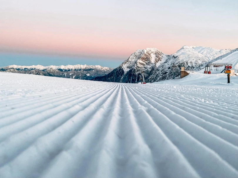 picture taken from the piste, corduroy stripes in focus