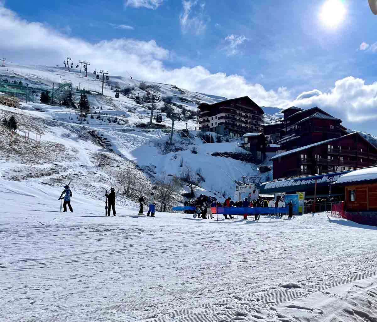 Les Bruyeres base area, with chalets up hill and a gondola