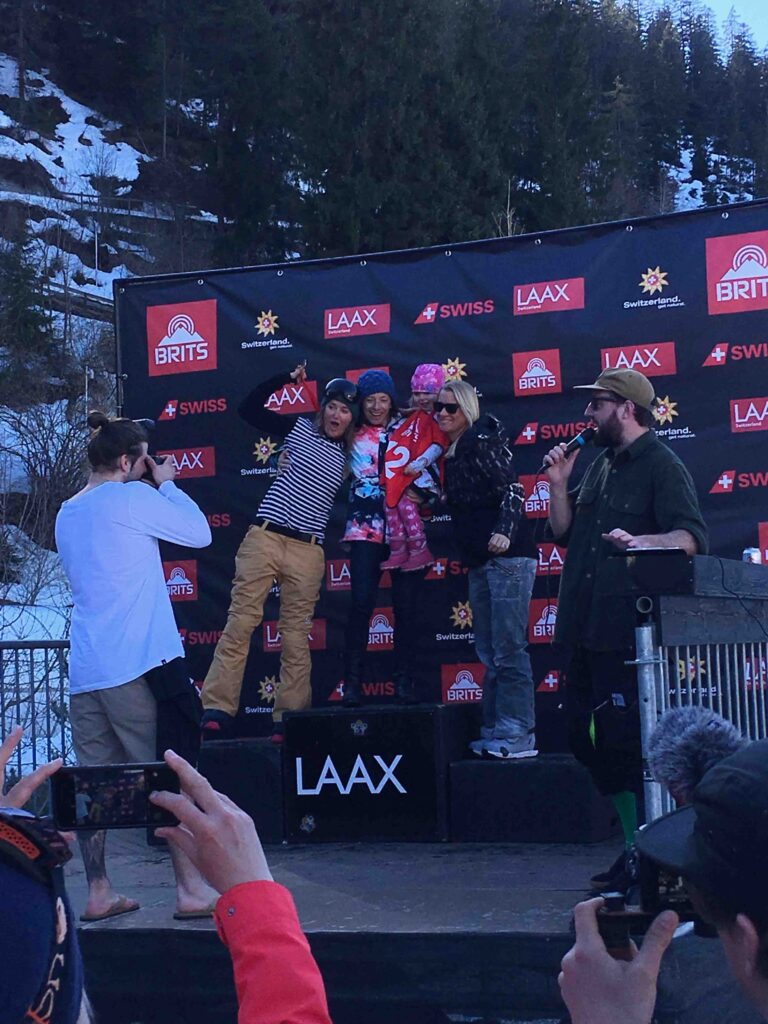 three snowboarders on the podium