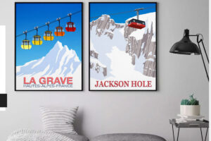 two ski posters framed on a sitting room wall above a sofa