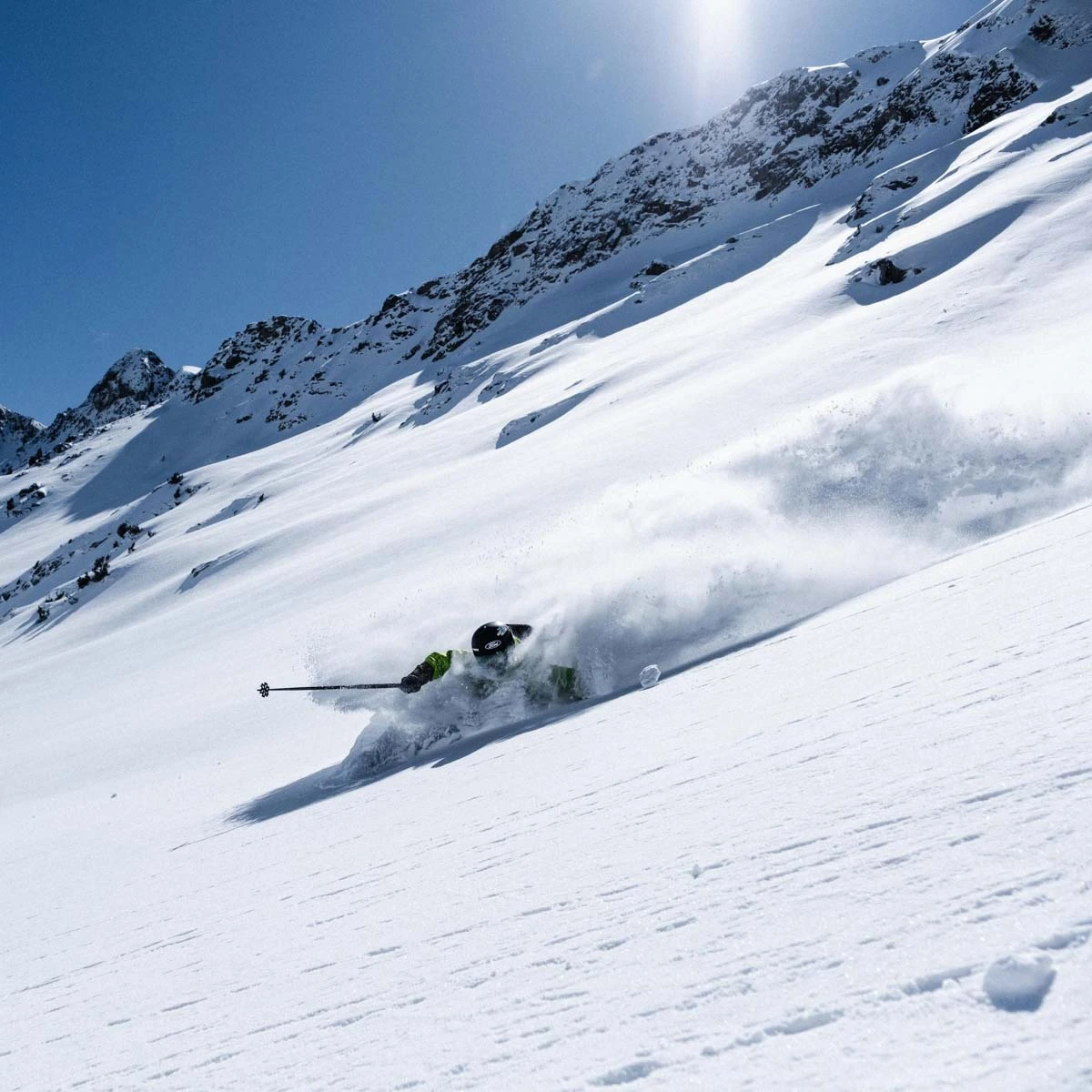 skier in deep, fresh powder