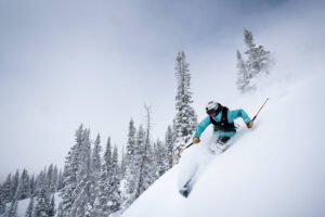 a beautiful turn on skis made on fresh snow steeps