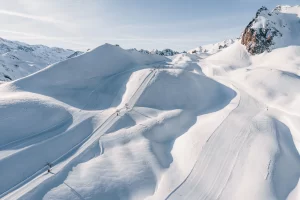 Courchevel pure white pistes shot from a drone, above