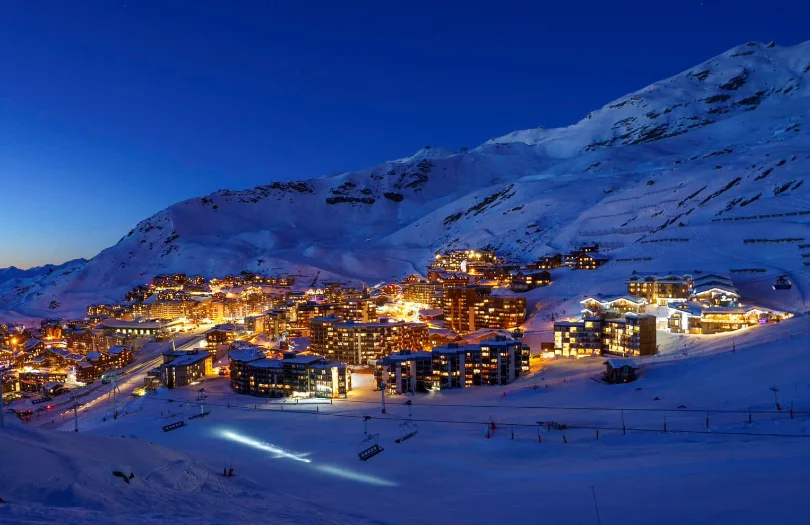 a ski village lit up at night