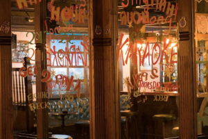 writing on a mirror in a bar